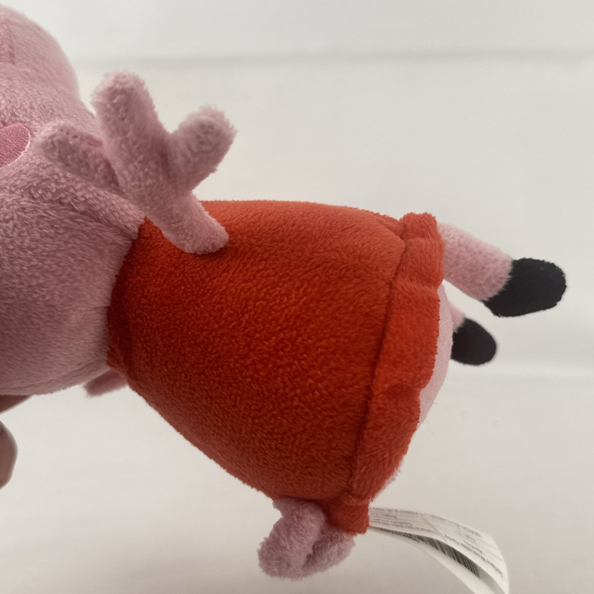Just Play 7-inch Peppa Pig pink plush bean bag doll wearing a red dress