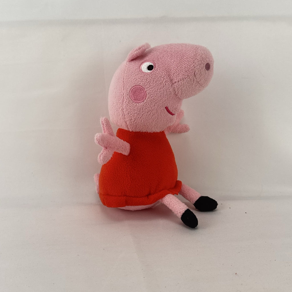 Just Play 7-inch Peppa Pig pink plush bean bag doll wearing a red dress