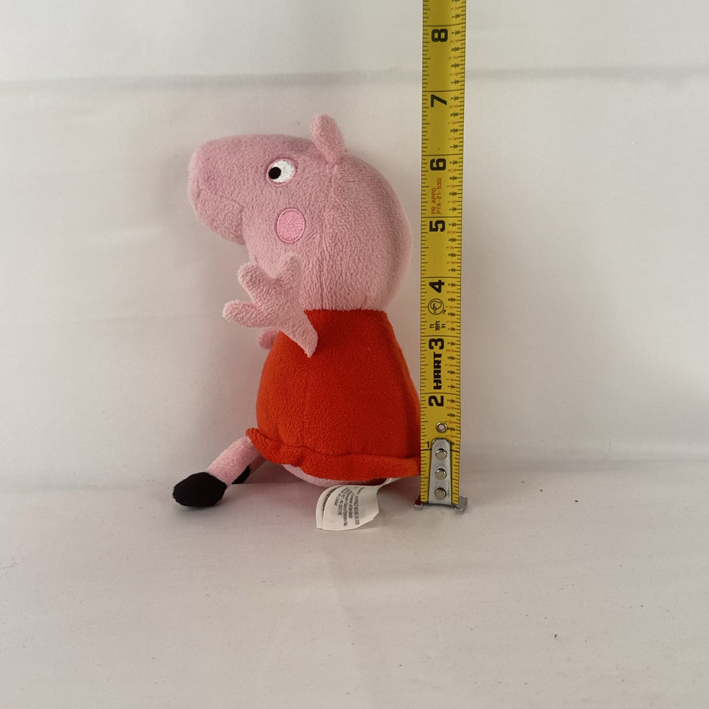 Just Play 7-inch Peppa Pig pink plush bean bag doll wearing a red dress