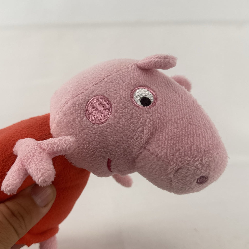 Just Play 7-inch Peppa Pig pink plush bean bag doll wearing a red dress
