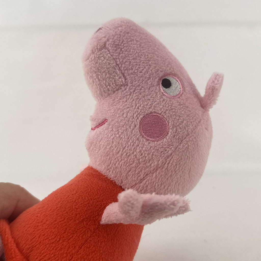 Just Play 7-inch Peppa Pig pink plush bean bag doll wearing a red dress