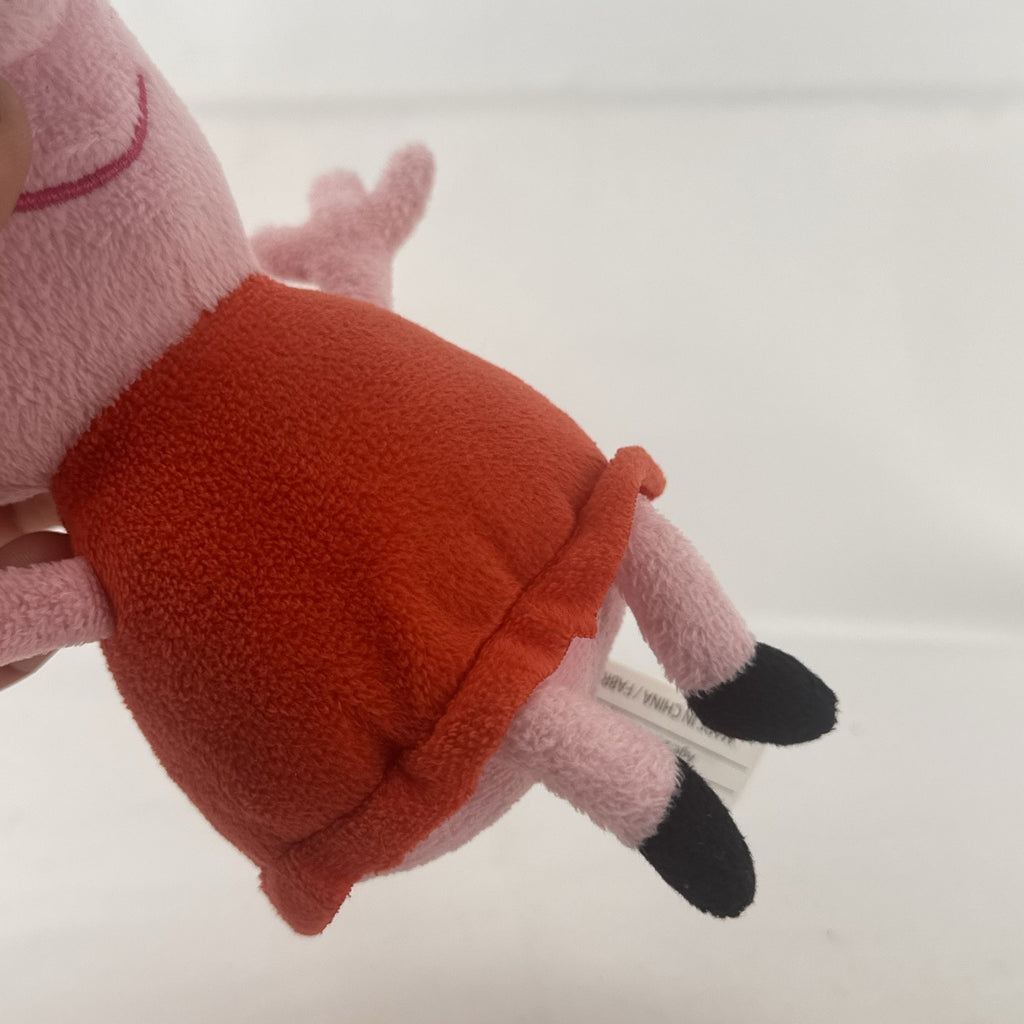 Just Play 7-inch Peppa Pig pink plush bean bag doll wearing a red dress