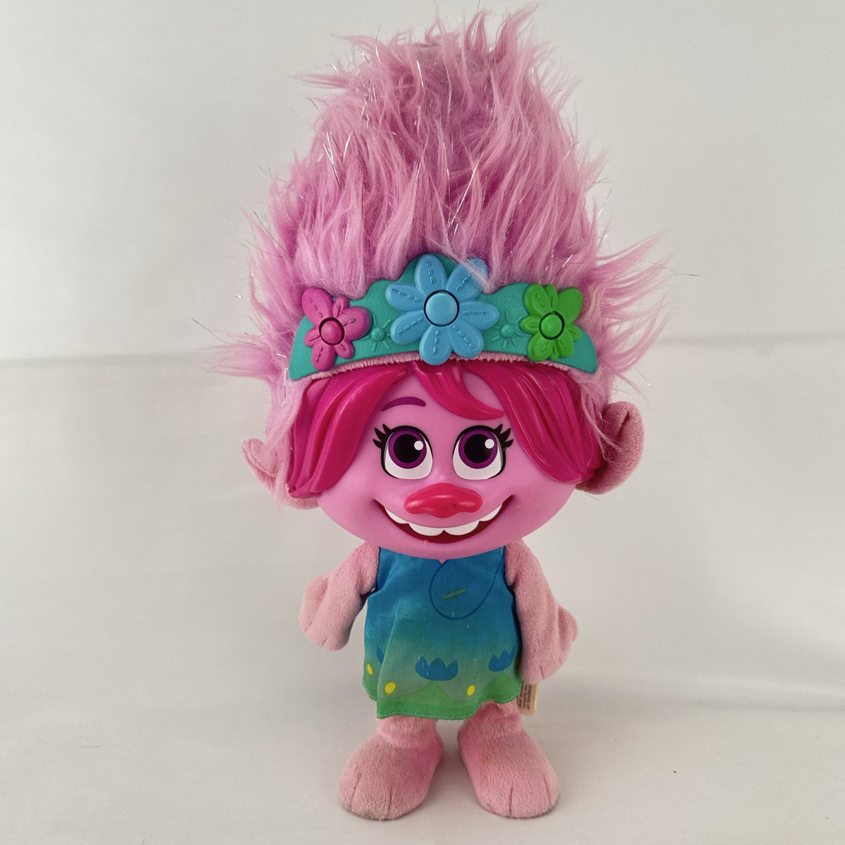 Just Play DreamWorks Trolls Princess Poppy 12-inch plush doll with molded plastic face and pink tinsel hair