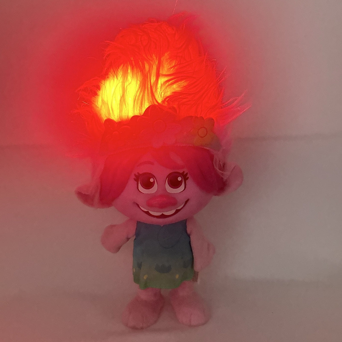 Just Play DreamWorks Trolls Princess Poppy 12-inch plush doll with molded plastic face and pink tinsel hair