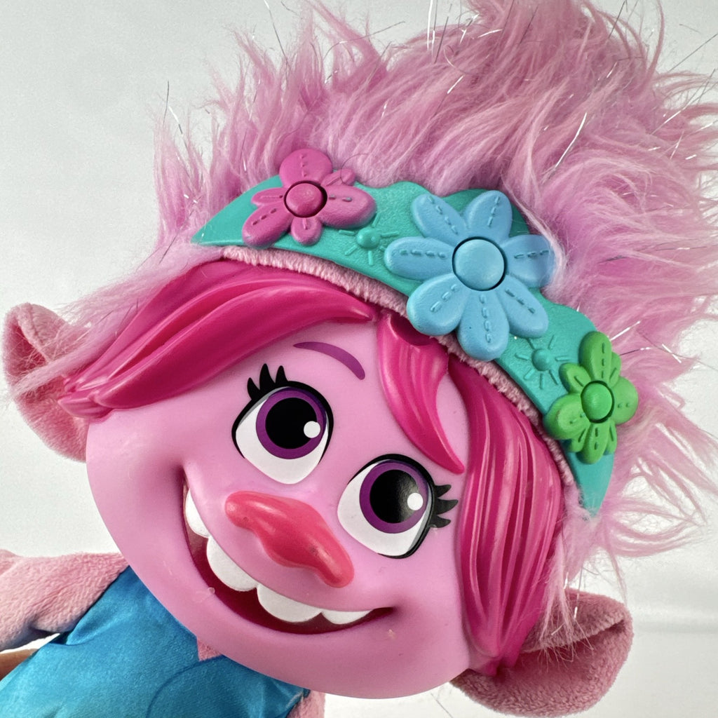Just Play DreamWorks Trolls Princess Poppy 12-inch plush doll with molded plastic face and pink tinsel hair