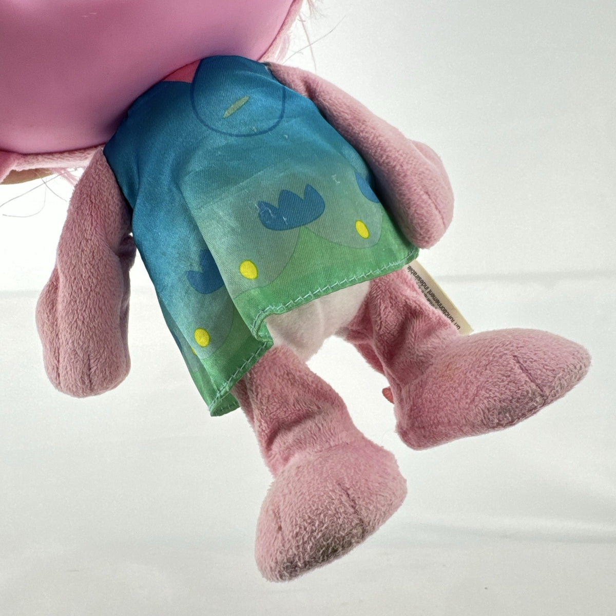 Just Play DreamWorks Trolls Princess Poppy 12-inch plush doll with molded plastic face and pink tinsel hair
