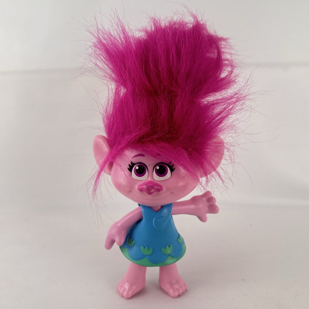 Hasbro DreamWorks Trolls Poppy doll with tall pink hair wearing blue patterned dress