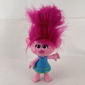 Hasbro DreamWorks Trolls Poppy doll with tall pink hair wearing blue patterned dress