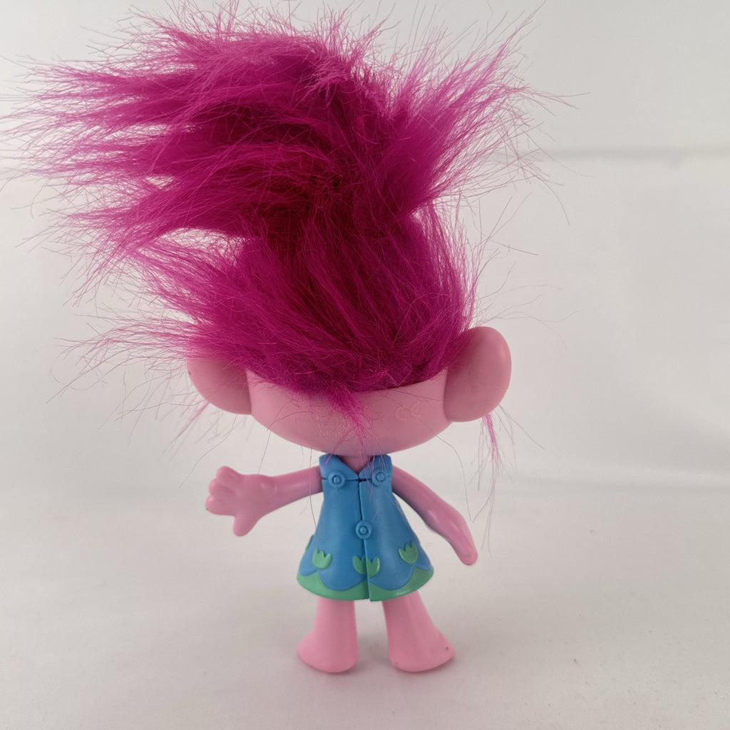 Hasbro DreamWorks Trolls Poppy doll with tall pink hair wearing blue patterned dress