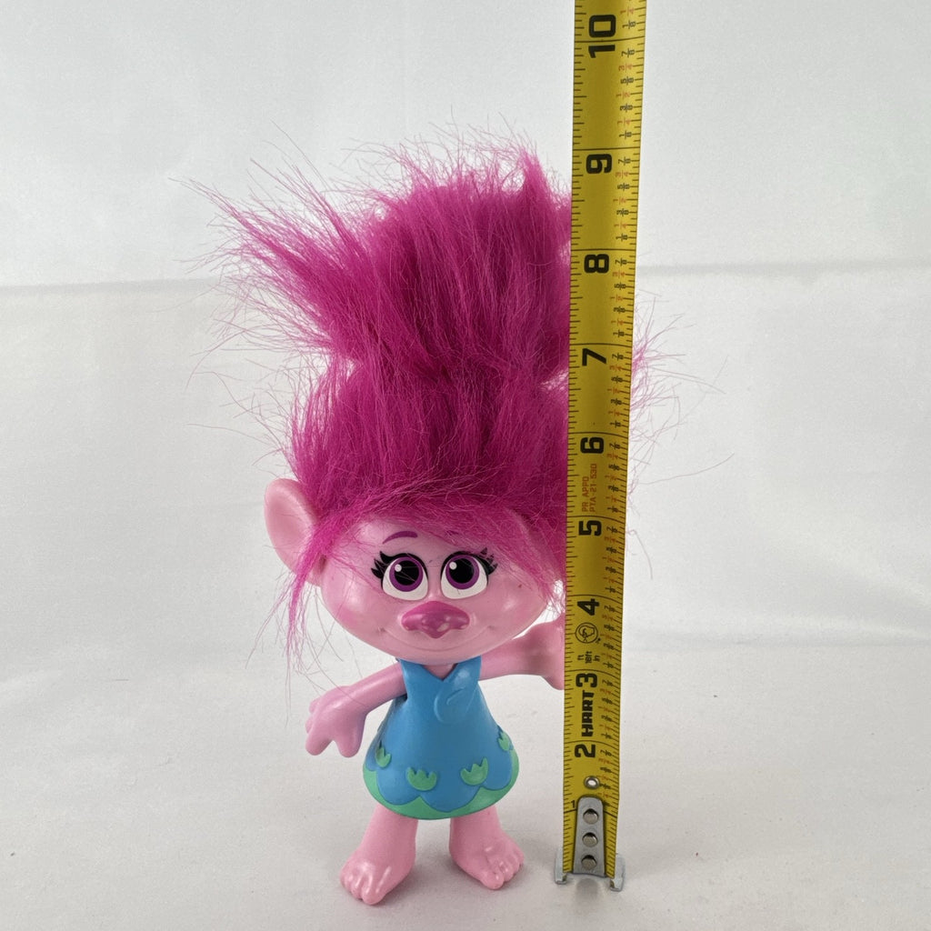Hasbro DreamWorks Trolls Poppy doll with tall pink hair wearing blue patterned dress
