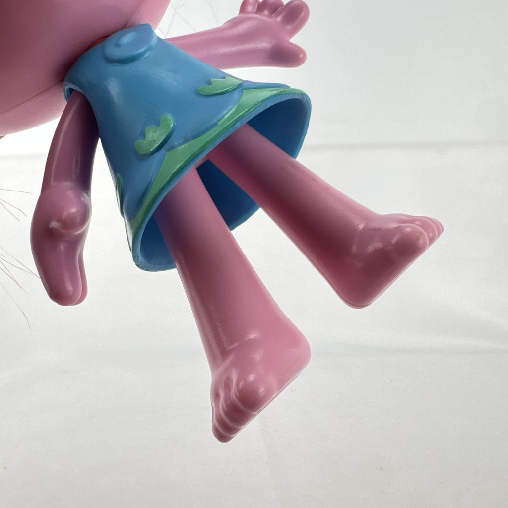Hasbro DreamWorks Trolls Poppy doll with tall pink hair wearing blue patterned dress