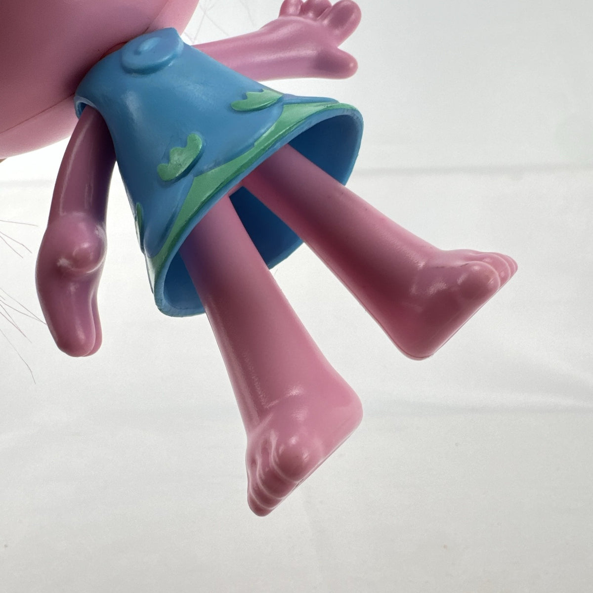 Hasbro DreamWorks Trolls Poppy doll with tall pink hair wearing blue patterned dress