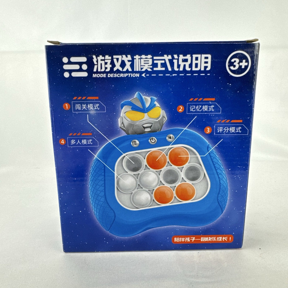 Red Ultraman quick push handheld electronic game console with light-up buttons in original packaging