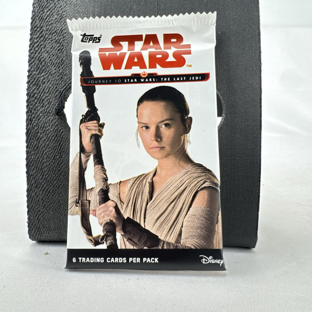 Sealed 2017 Topps Journey to Star Wars The Last Jedi foil trading card pack with Rey artwork