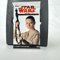 Sealed 2017 Topps Journey to Star Wars: The Last Jedi trading card pack featuring Rey on the foil wrapper
