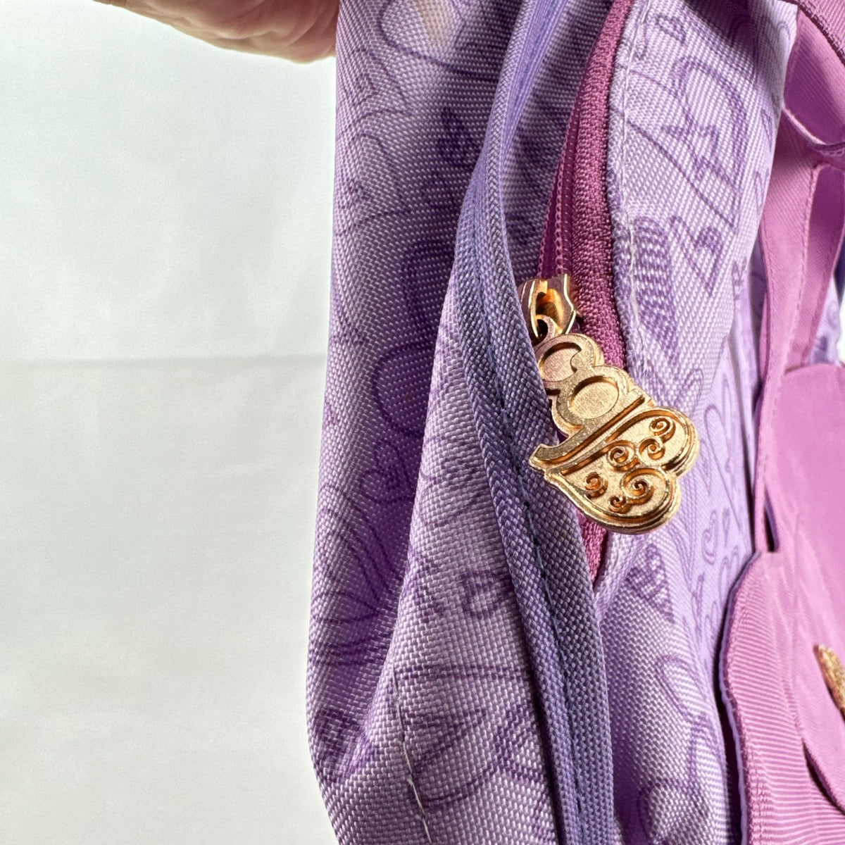 Battat Our Generation pink and purple heart print 18-inch doll carrier backpack
