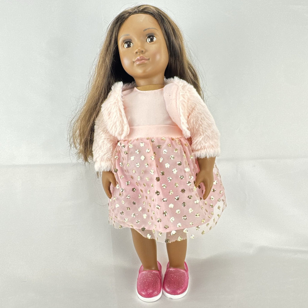 American Girl Truly Me 18-inch doll with dark skin and brown hair wearing a pink sparkle party dress and shrug
