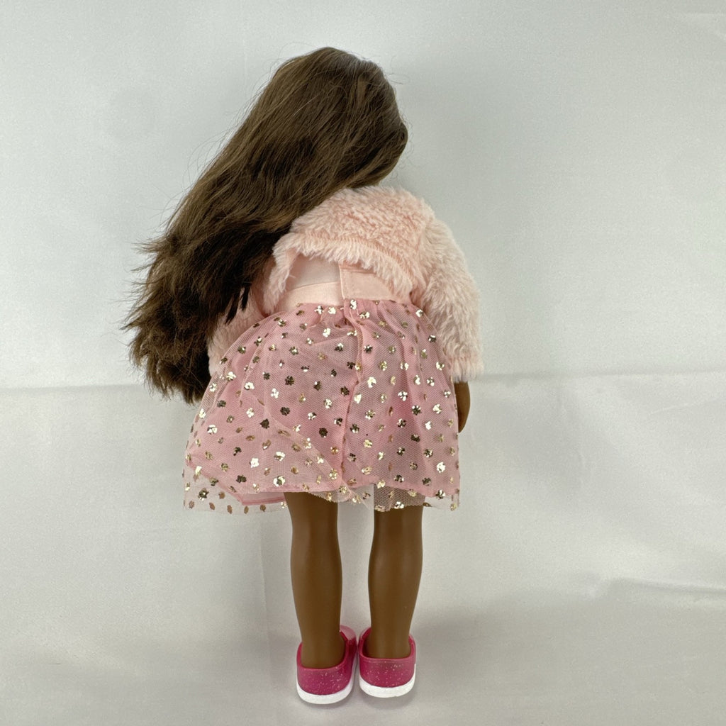 American Girl Truly Me 18-inch doll with dark skin and brown hair wearing a pink sparkle party dress and shrug
