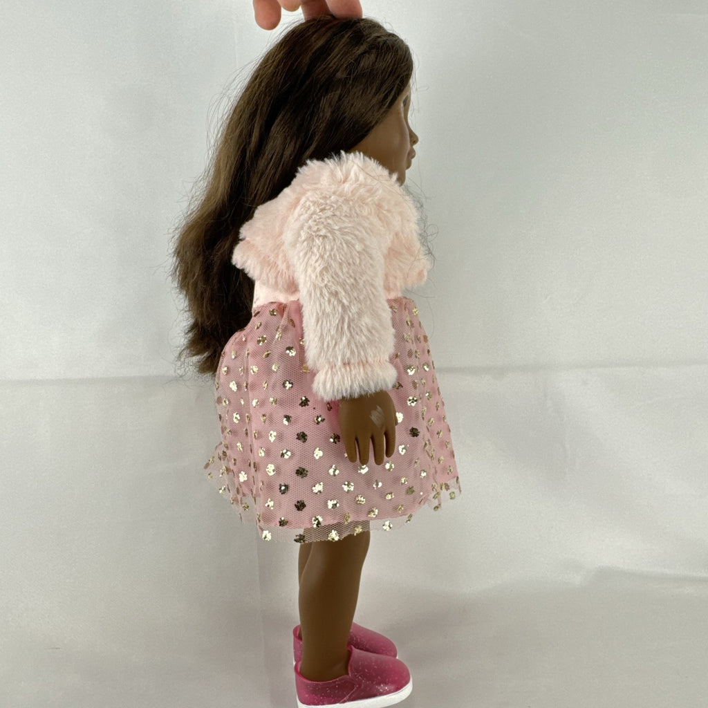 American Girl Truly Me 18-inch doll with dark skin and brown hair wearing a pink sparkle party dress and shrug
