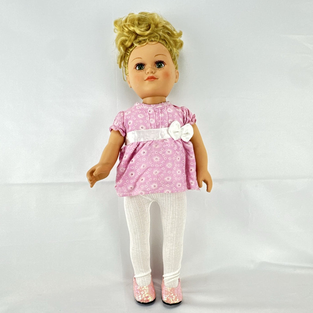 Cititoy 18-inch vinyl girl doll with blonde hair updo, green eyes, freckles, and pink floral outfit with glitter shoes.