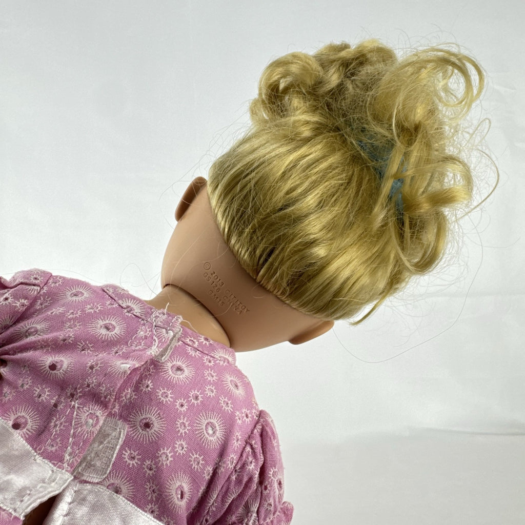 Cititoy 18-inch vinyl girl doll with blonde hair updo, green eyes, freckles, and pink floral outfit with glitter shoes.