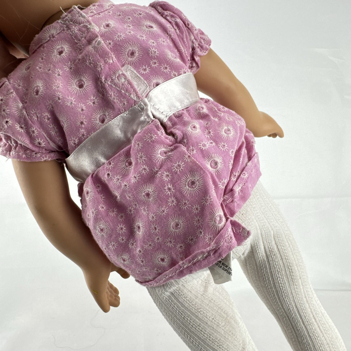 Cititoy 18-inch vinyl girl doll with blonde hair updo, green eyes, freckles, and pink floral outfit with glitter shoes.
