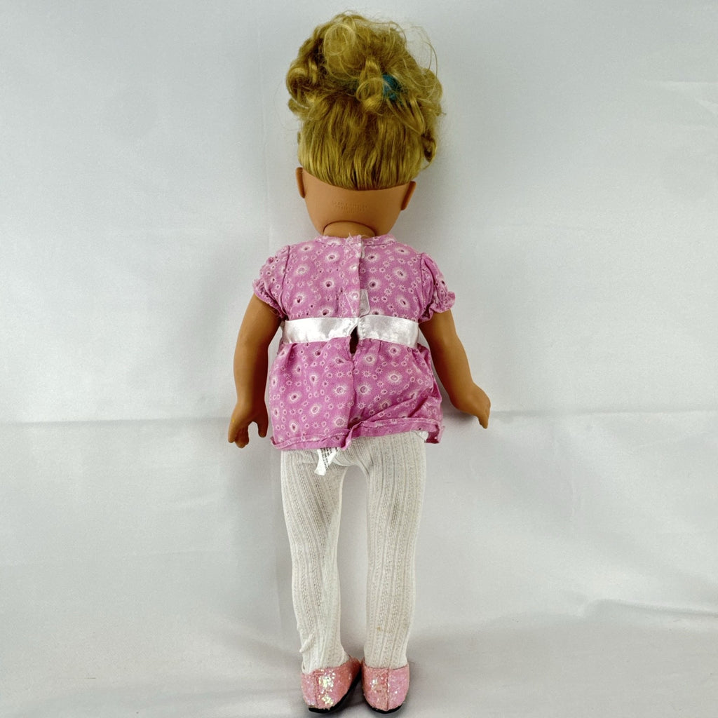 Cititoy 18-inch vinyl girl doll with blonde hair updo, green eyes, freckles, and pink floral outfit with glitter shoes.