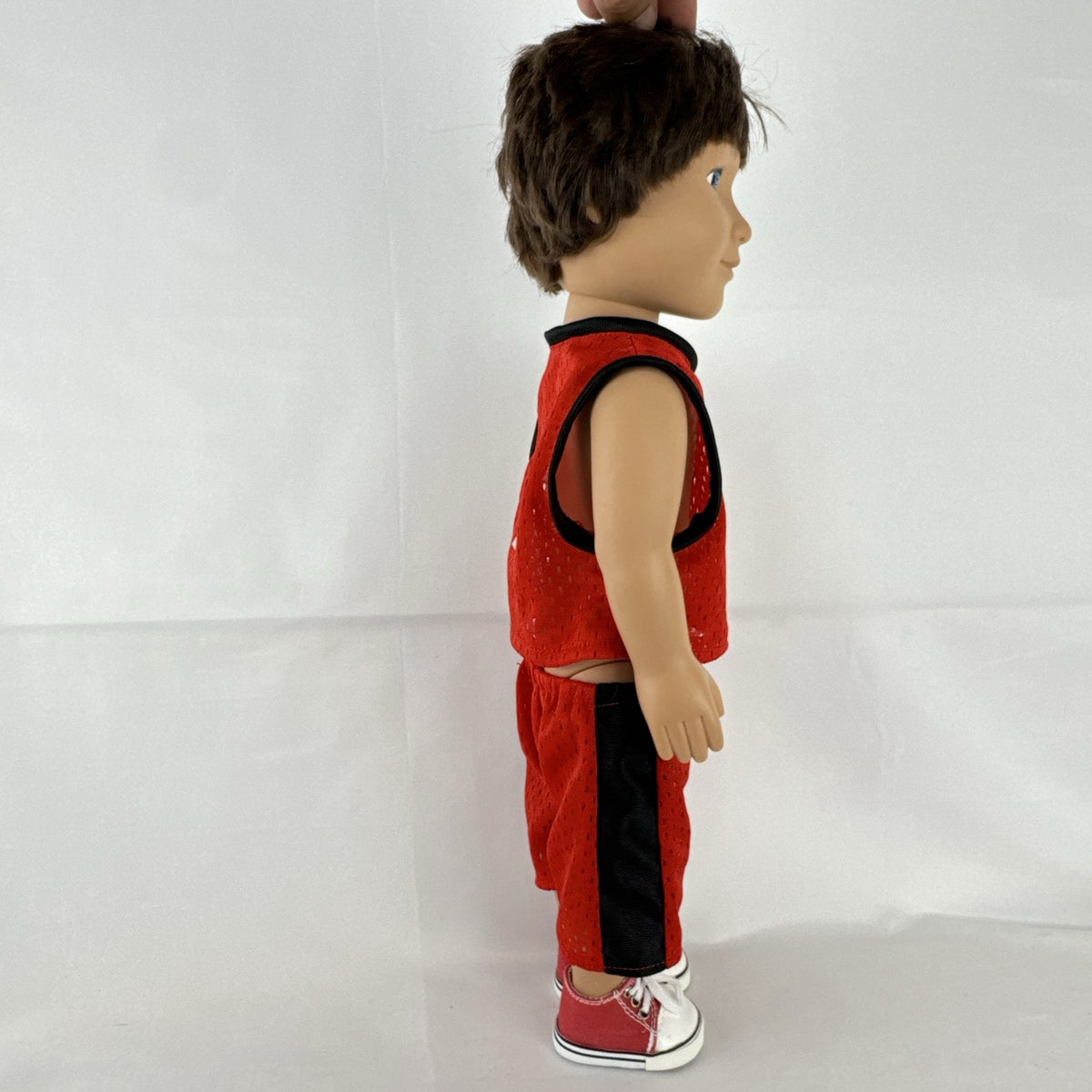 Cititoy 18-inch vinyl boy play doll with blue eyes and brown hair wearing a red basketball jersey and sneakers