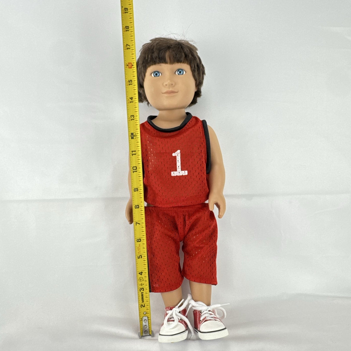 Cititoy 18-inch vinyl boy play doll with blue eyes and brown hair wearing a red basketball jersey and sneakers