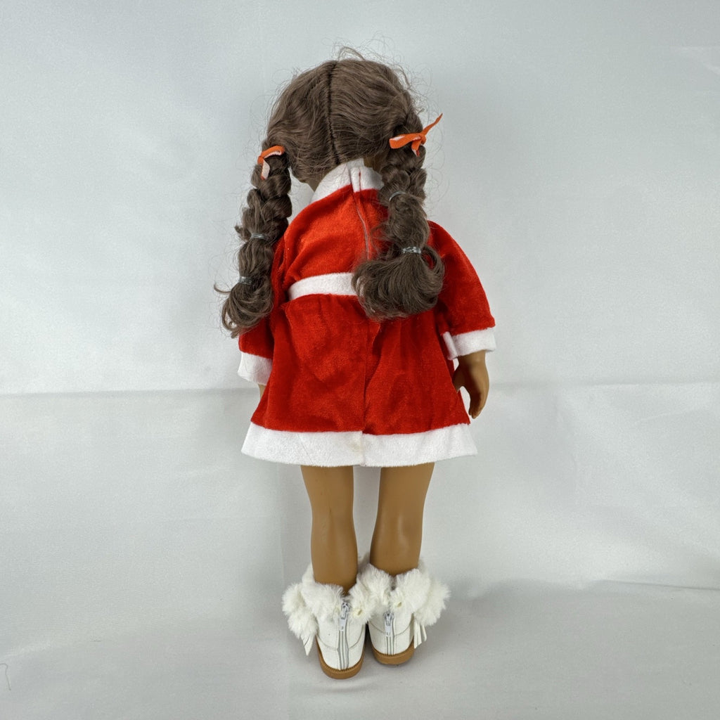 Battat Our Generation 18-inch doll with brown braided pigtails wearing a red and white holiday Santa dress and boots