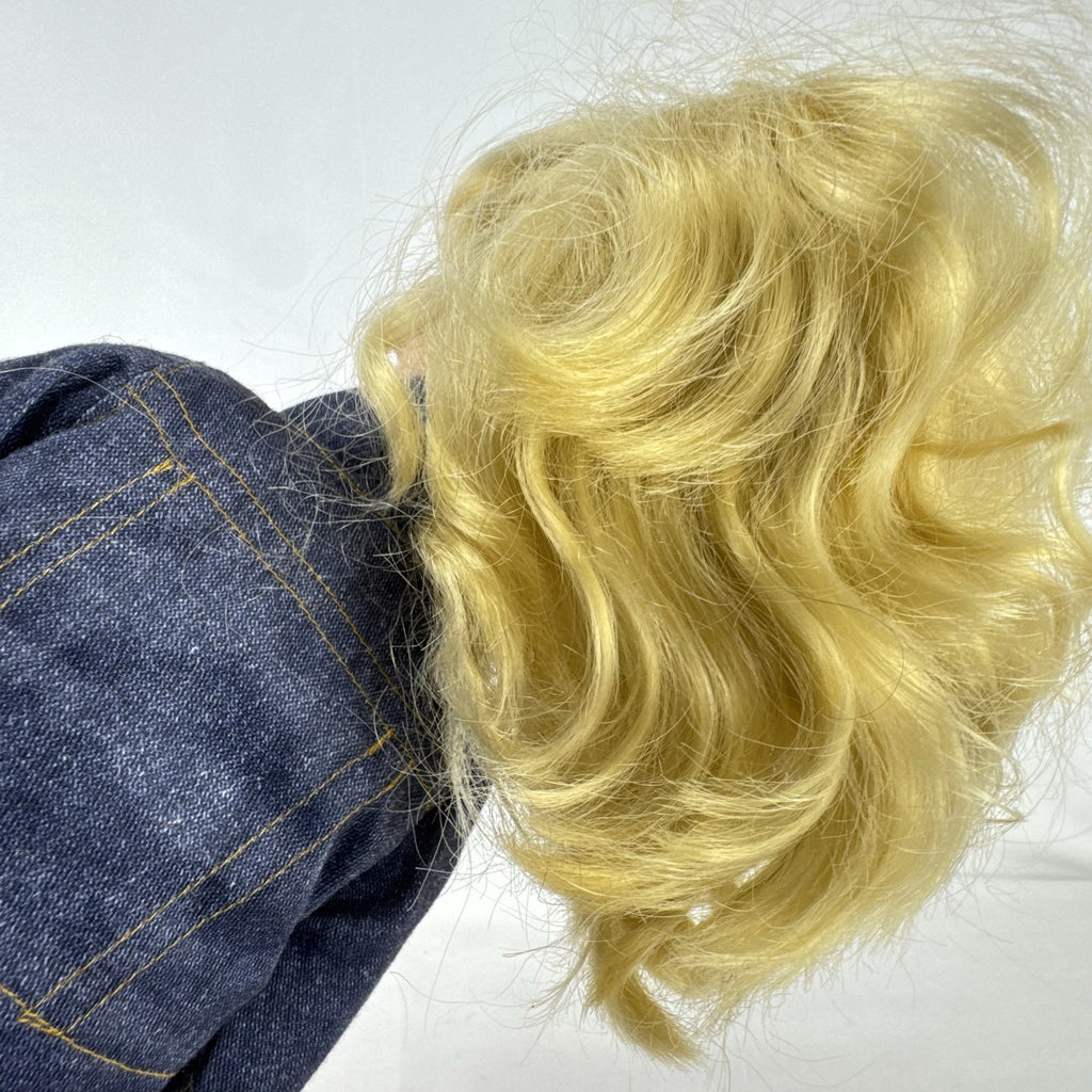 Geoffrey LLC Journey Girls 18-inch doll with blonde rainbow-streaked hair, floral dress, and denim jacket.