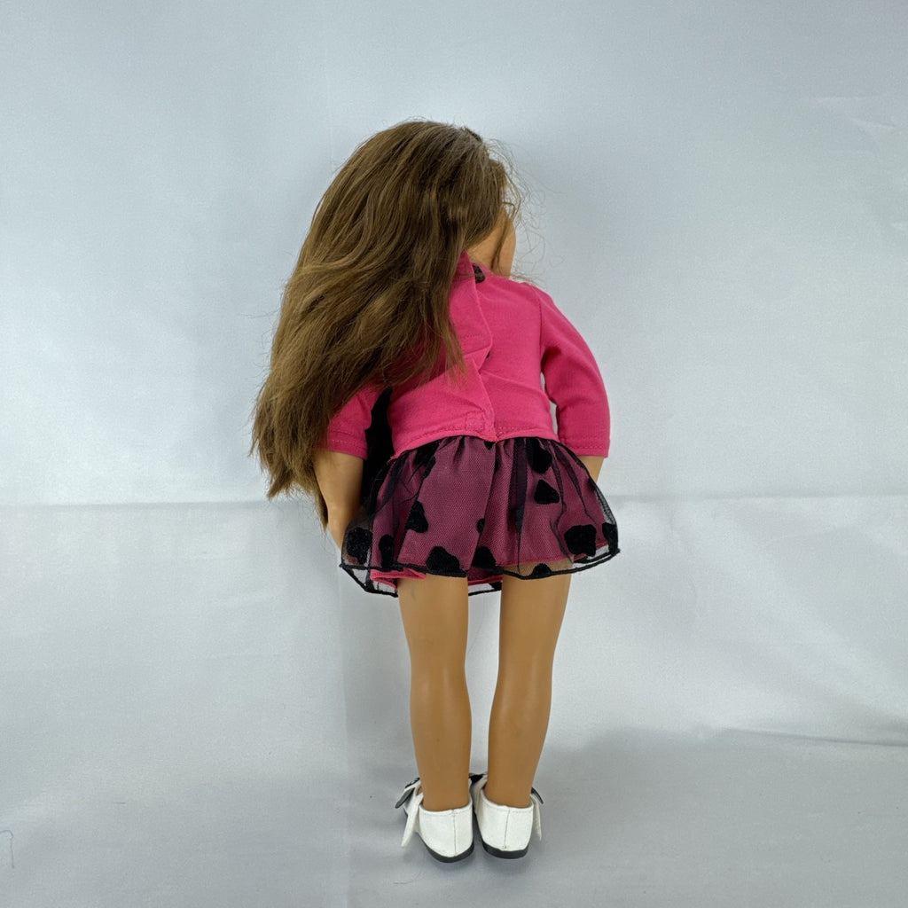 Battat Our Generation 18-inch brunette play doll wearing a pink cupcake shirt, tulle skirt, and panda shoes.