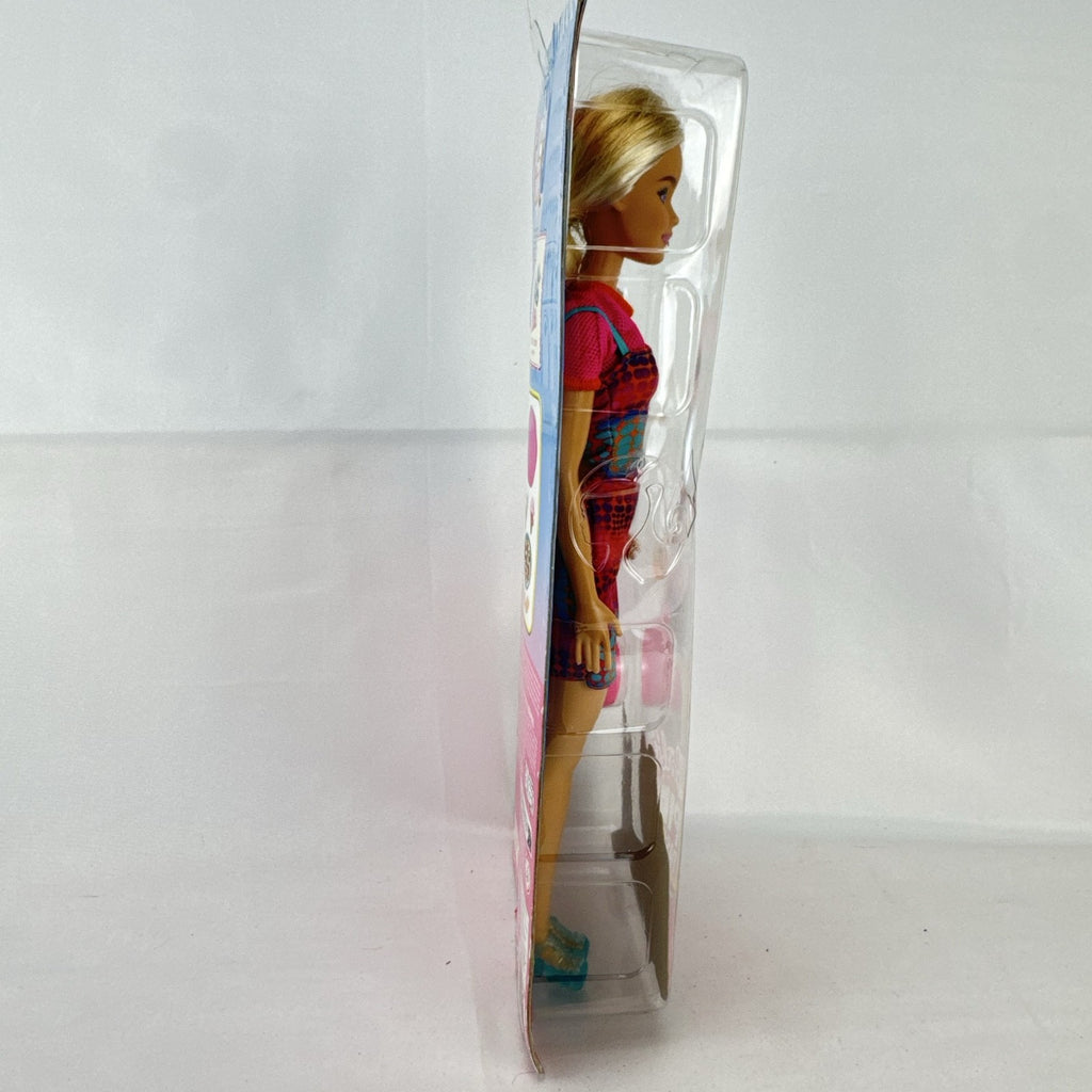 Mattel Barbie Pink Passport Italy travel doll in patterned sundress with pizza and gelato accessories