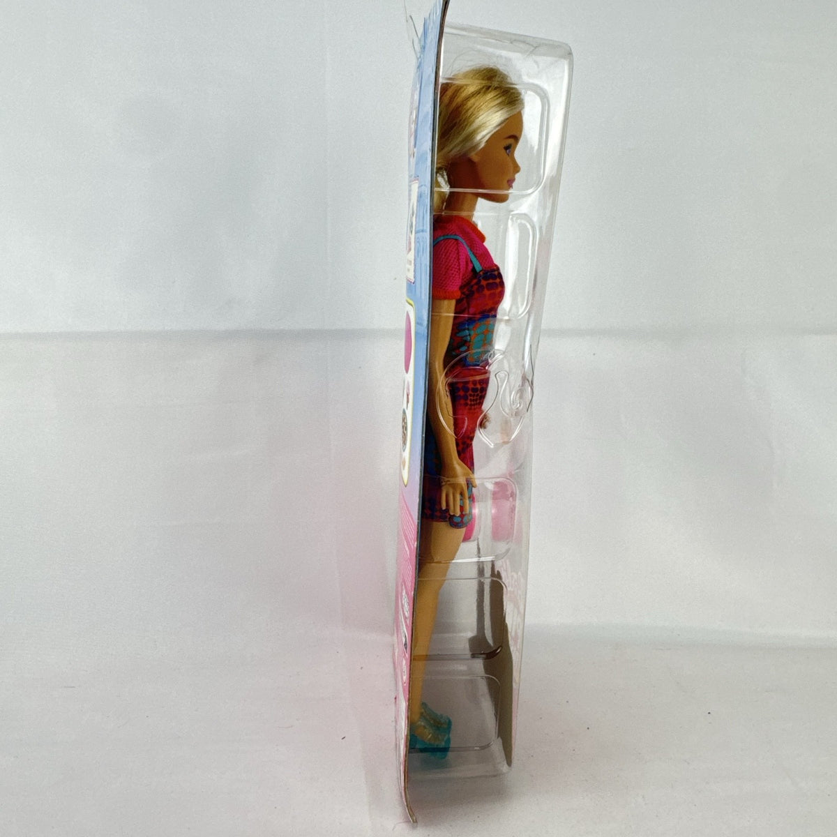 Mattel Barbie Pink Passport Italy travel doll in patterned sundress with pizza and gelato accessories