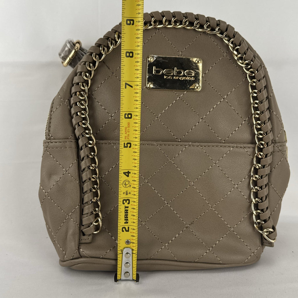 bebe Julia mini backpack purse in taupe quilted faux leather with gold chain trim and original tags