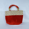 Red velvet top handle evening handbag with ornate gold-tone rhinestone and bead embellishments