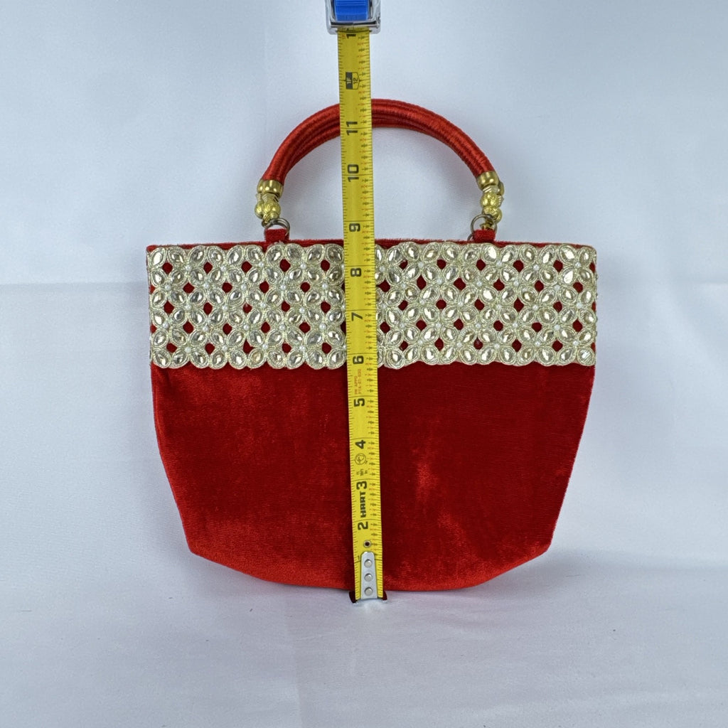Red velvet top handle evening handbag with ornate gold-tone rhinestone and bead embellishments