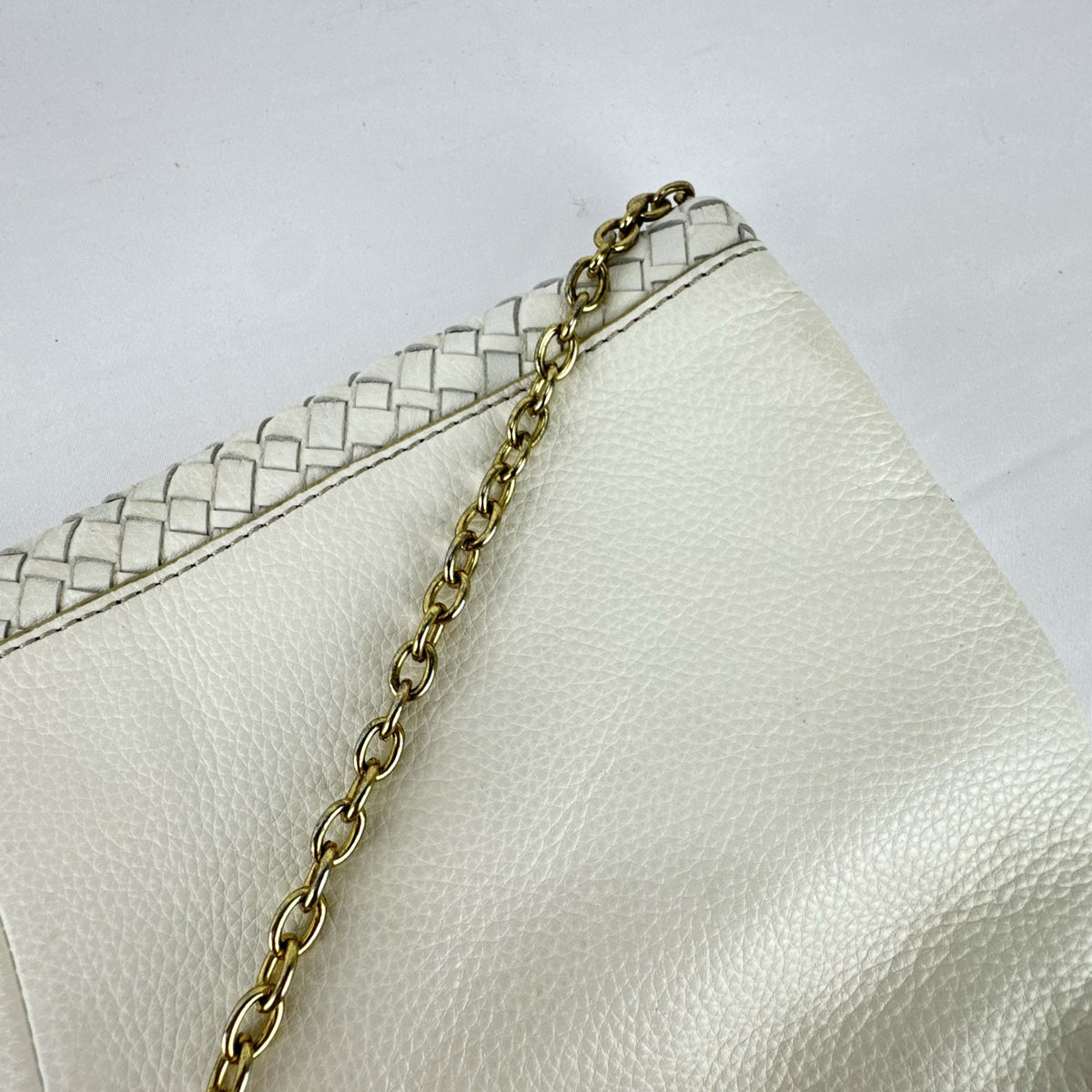 Banana Republic white pebbled leather foldover clutch with woven flap and gold chain strap
