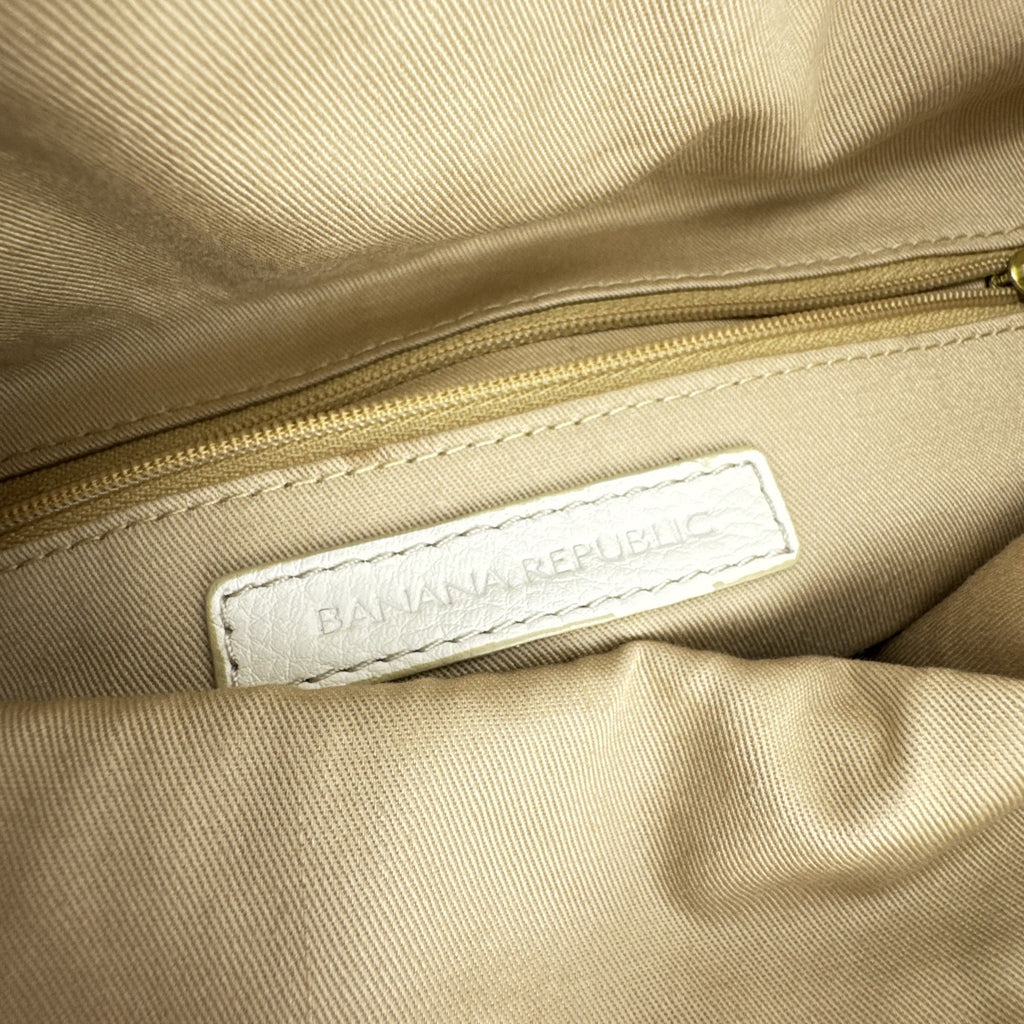 Banana Republic white pebbled leather foldover clutch with woven flap and gold chain strap