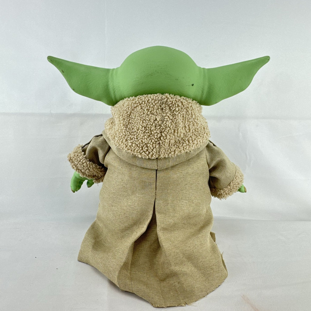 Mattel Star Wars Grogu 11-inch plush figure with sculpted vinyl head and tan faux-shearling robe