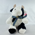 Star Gifts 13-inch black and white Holstein cow plush wearing a green plaid ribbon and jingle bell