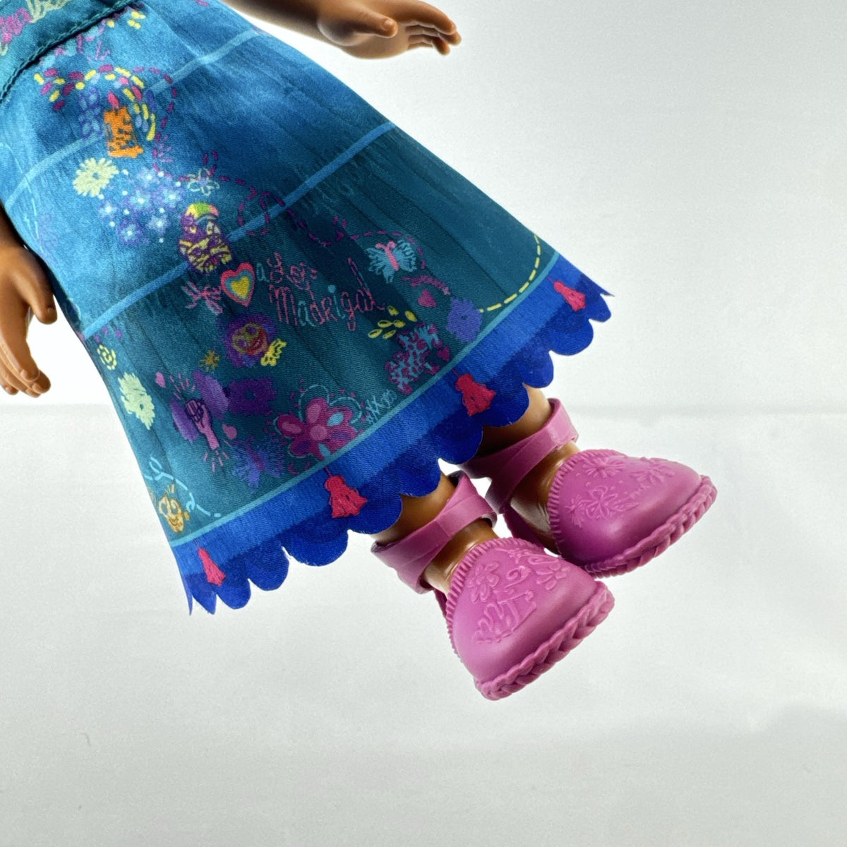 JAKKS Pacific Disney Encanto Mirabel Madrigal 14-inch doll with green glasses and patterned dress