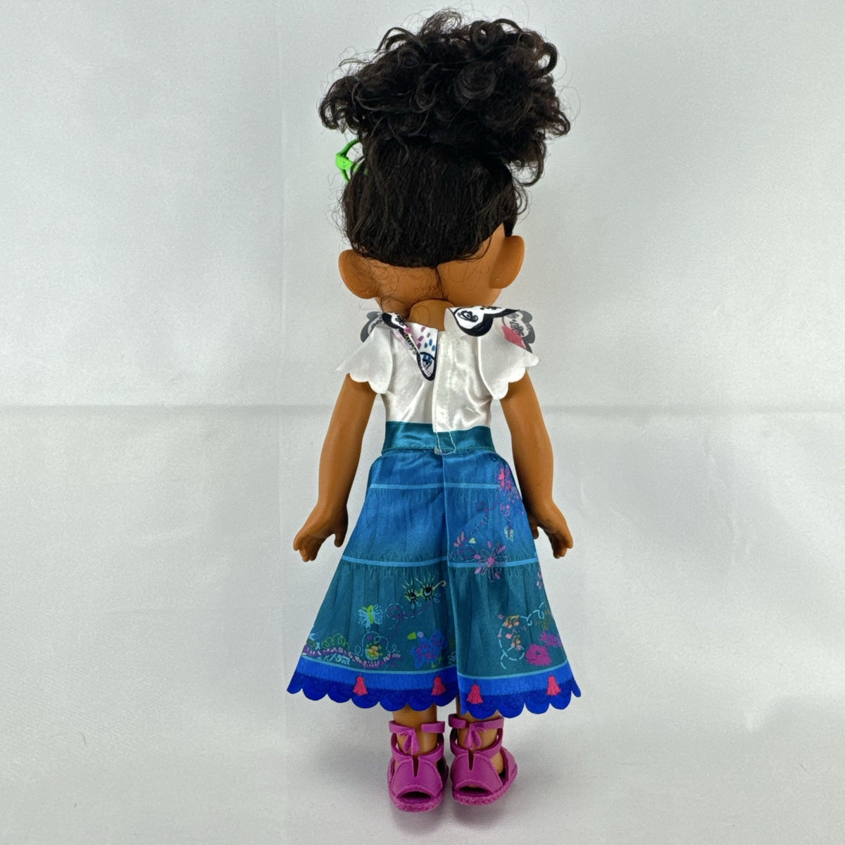JAKKS Pacific Disney Encanto Mirabel Madrigal 14-inch doll with green glasses and patterned dress