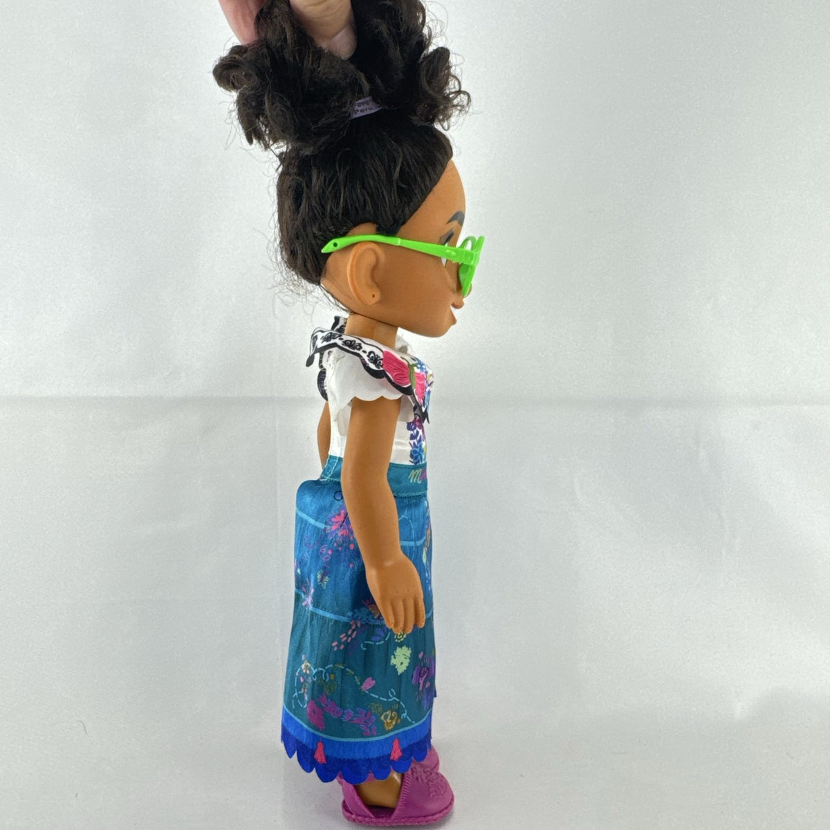 JAKKS Pacific Disney Encanto Mirabel Madrigal 14-inch doll with green glasses and patterned dress