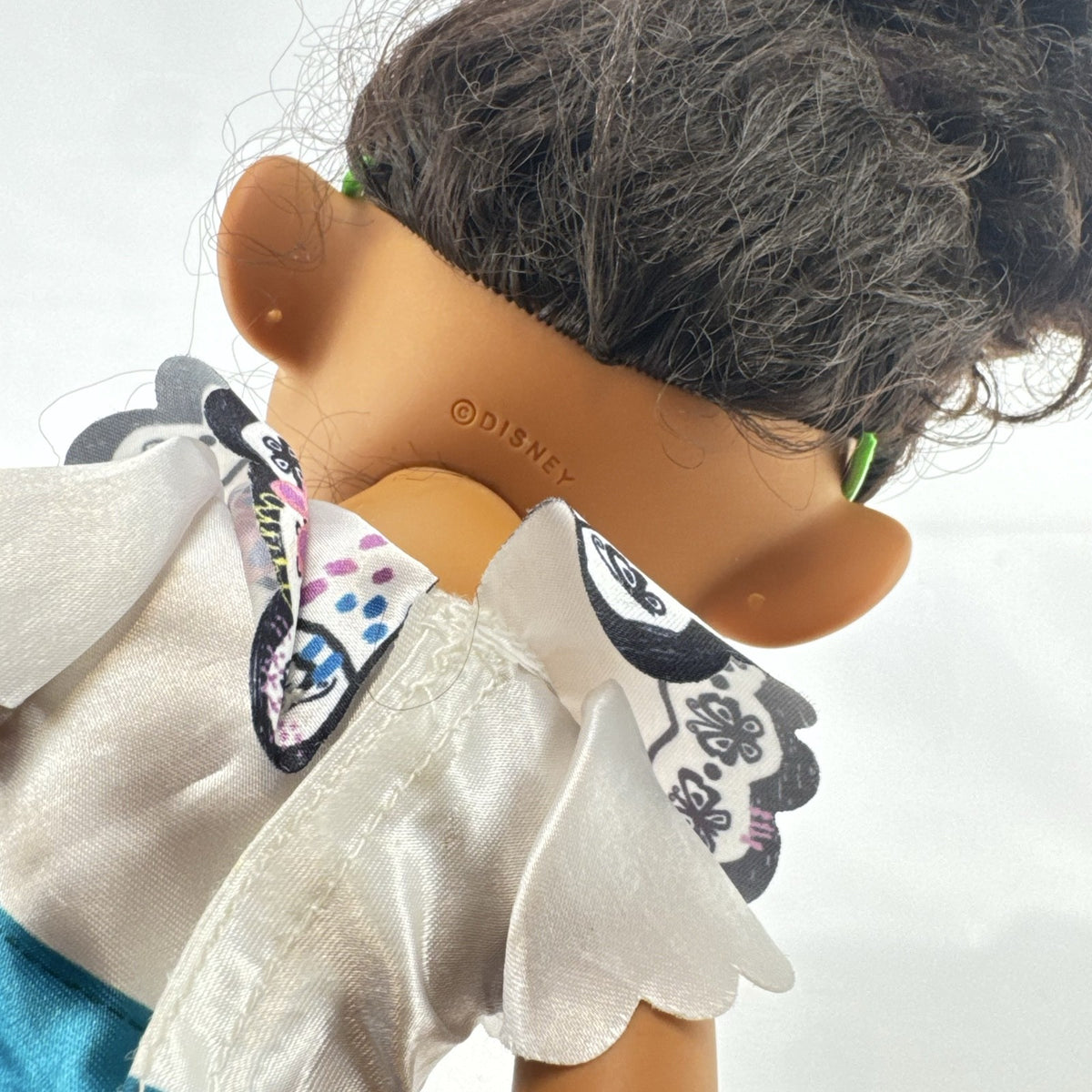 JAKKS Pacific Disney Encanto Mirabel Madrigal 14-inch doll with green glasses and patterned dress