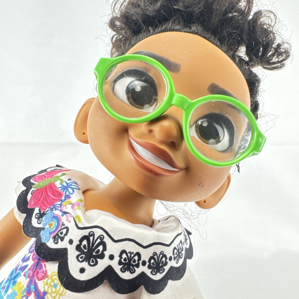 JAKKS Pacific Disney Encanto Mirabel Madrigal 14-inch doll with green glasses and patterned dress