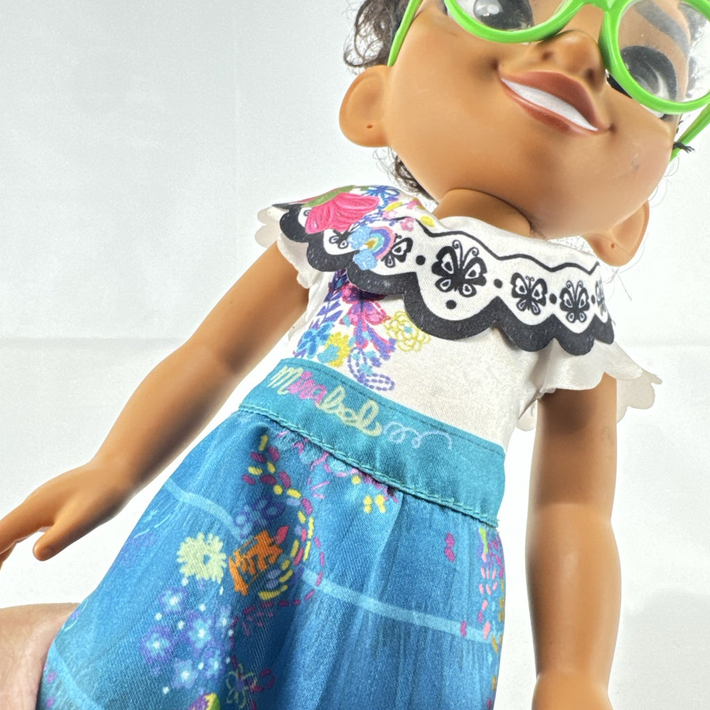 JAKKS Pacific Disney Encanto Mirabel Madrigal 14-inch doll with green glasses and patterned dress
