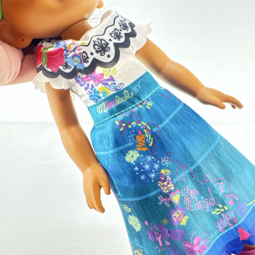 JAKKS Pacific Disney Encanto Mirabel Madrigal 14-inch doll with green glasses and patterned dress