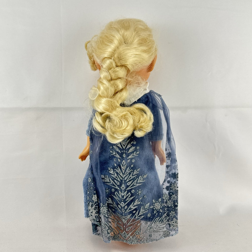JAKKS Pacific Disney Frozen Elsa 13-inch toddler doll wearing blue winter dress with faux fur trim