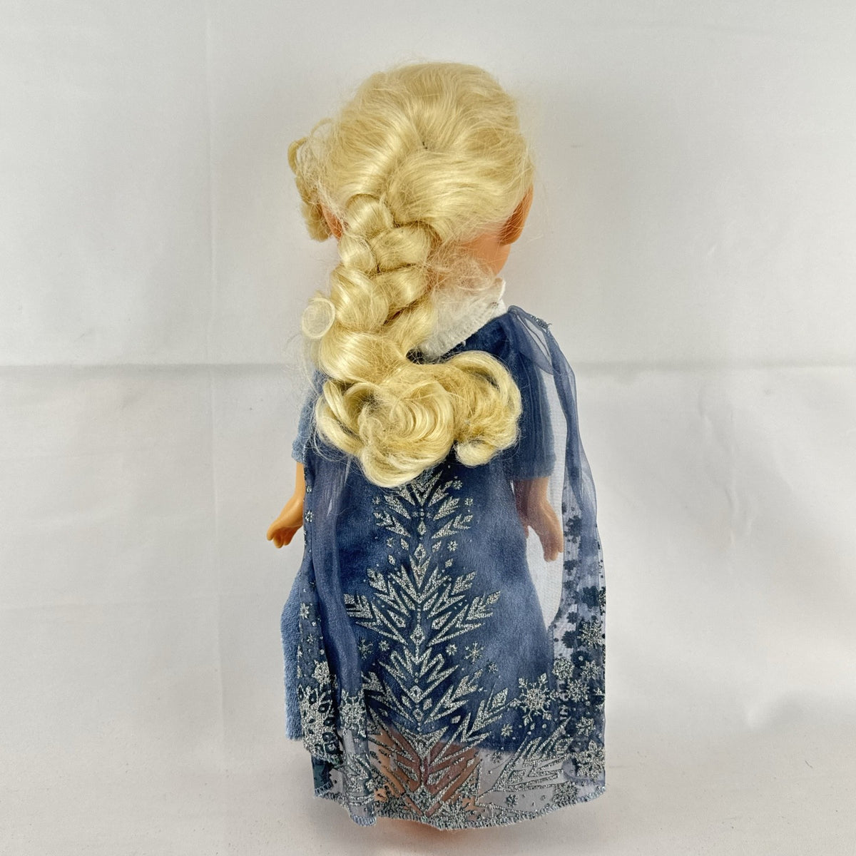 JAKKS Pacific Disney Frozen Elsa 13-inch toddler doll wearing blue winter dress with faux fur trim